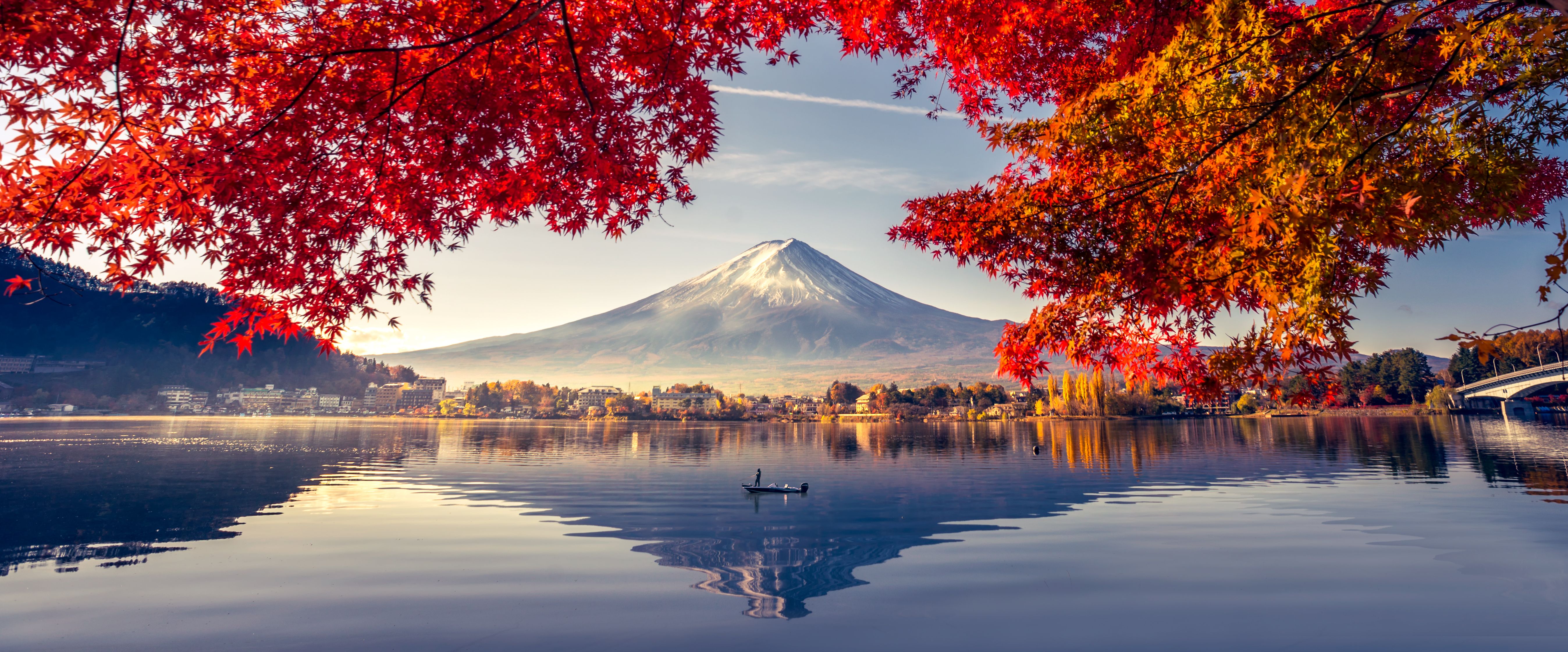 Mount Fuji framed by vibrant autumn foliage