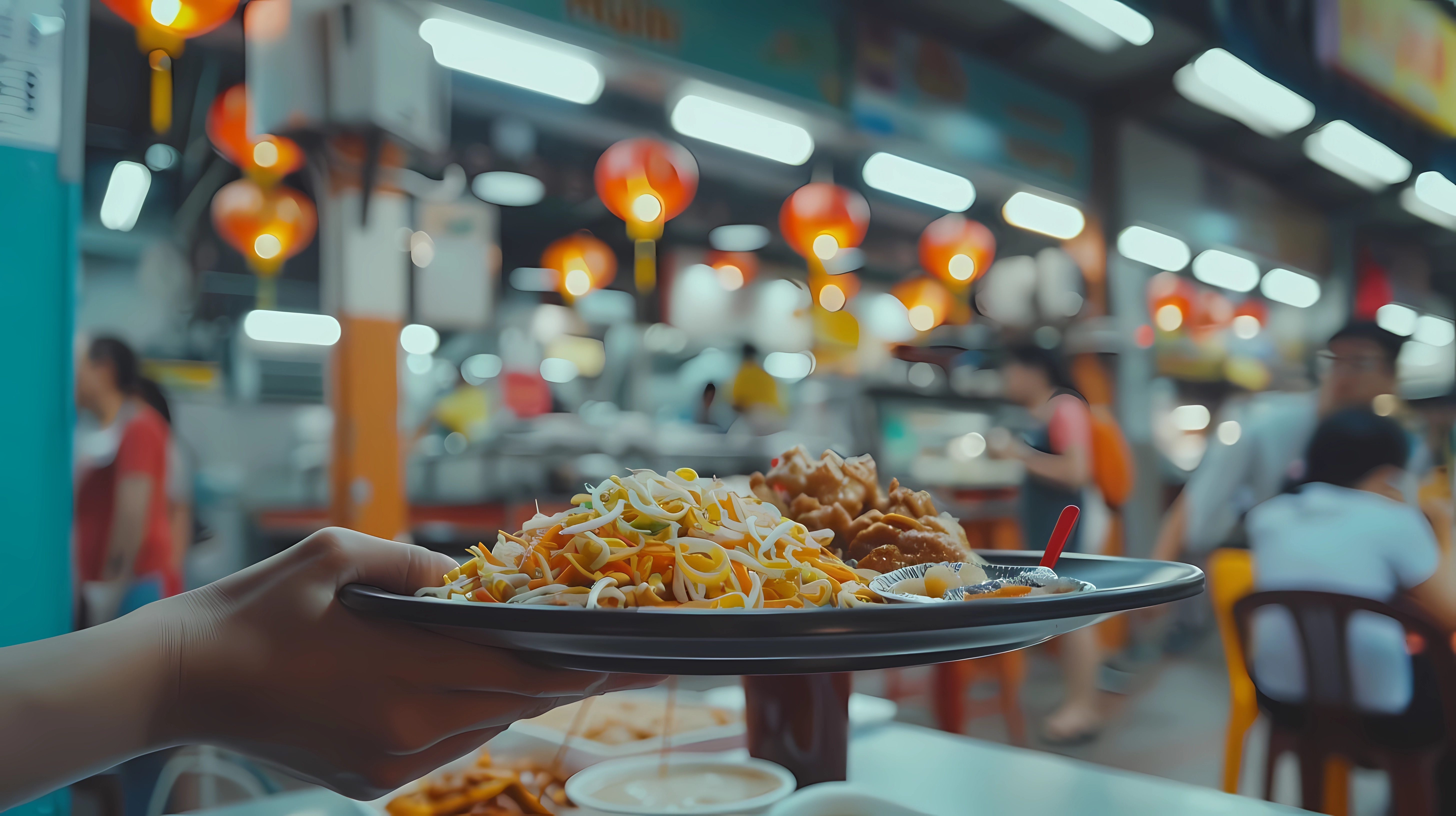 Singapore hawker center food stalls and diners